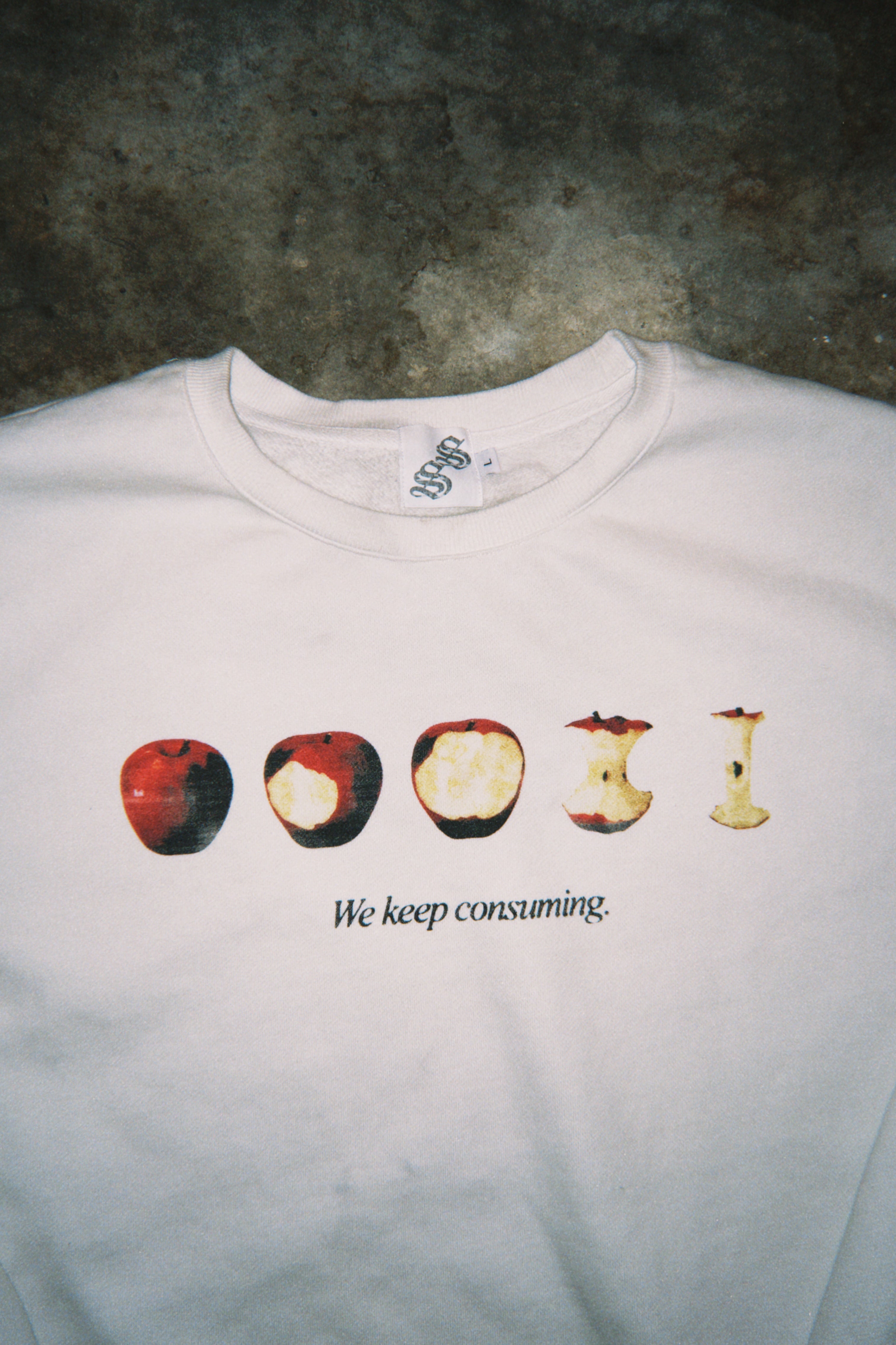 WE KEEP CONSUMING Sweatshirt